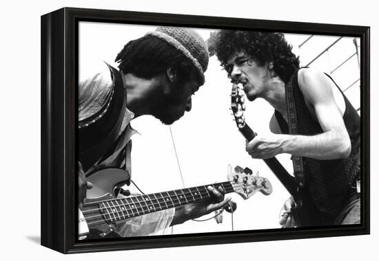 Guitarists David Brown And Carlos Santana During Music And Art Festival In Woodstock, August 1969-null-Framed Stretched Canvas