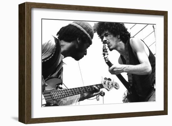 Guitarists David Brown And Carlos Santana During Music And Art Festival In Woodstock, August 1969-null-Framed Photo