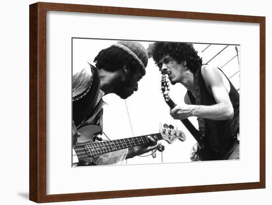 Guitarists David Brown And Carlos Santana During Music And Art Festival In Woodstock, August 1969-null-Framed Photo