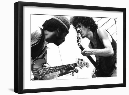 Guitarists David Brown And Carlos Santana During Music And Art Festival In Woodstock, August 1969-null-Framed Photo