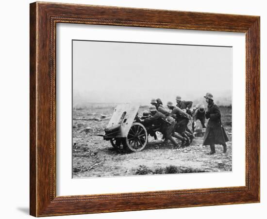 Gunners Manhandling a Trench Gun into a New Position on the Somme During World War I-Robert Hunt-Framed Photographic Print