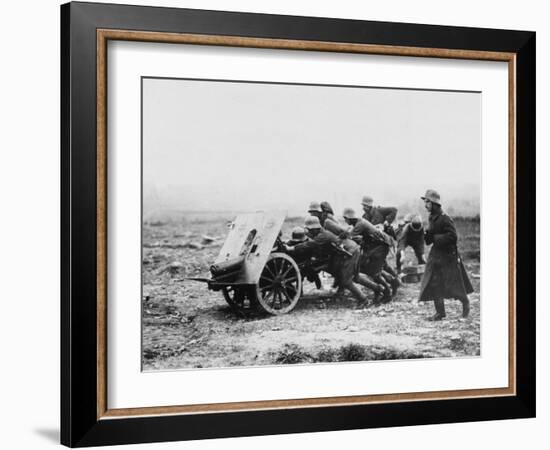 Gunners Manhandling a Trench Gun into a New Position on the Somme During World War I-Robert Hunt-Framed Photographic Print