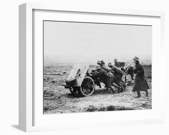 Gunners Manhandling a Trench Gun into a New Position on the Somme During World War I-Robert Hunt-Framed Photographic Print