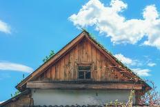 Old Attic on the Background of Blue Sky with Clouds-gutaper-Premium Photographic Print