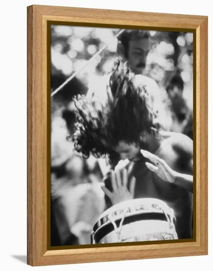 Guy Playing Drums at Woodstock Music Festival-null-Framed Premier Image Canvas