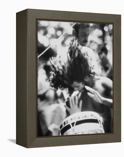 Guy Playing Drums at Woodstock Music Festival-null-Framed Premier Image Canvas