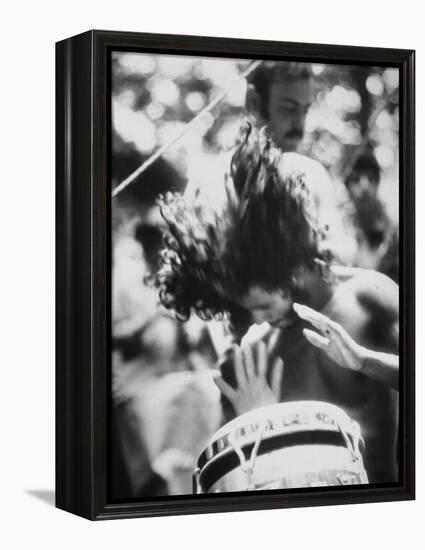 Guy Playing Drums at Woodstock Music Festival-null-Framed Premier Image Canvas