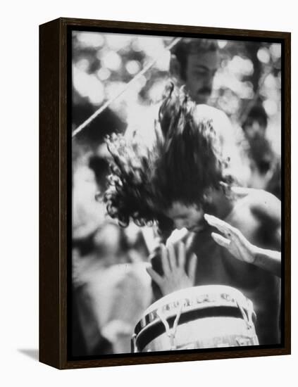 Guy Playing Drums at Woodstock Music Festival-null-Framed Premier Image Canvas