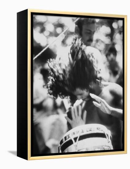 Guy Playing Drums at Woodstock Music Festival-null-Framed Premier Image Canvas
