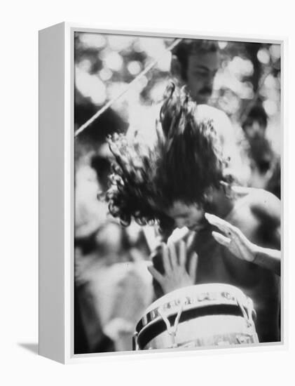 Guy Playing Drums at Woodstock Music Festival-null-Framed Premier Image Canvas