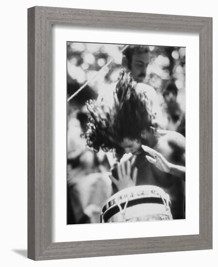 Guy Playing Drums at Woodstock Music Festival-null-Framed Photographic Print