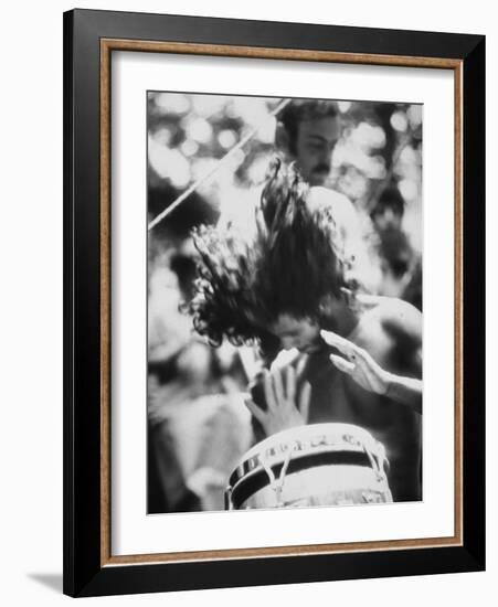 Guy Playing Drums at Woodstock Music Festival-null-Framed Photographic Print