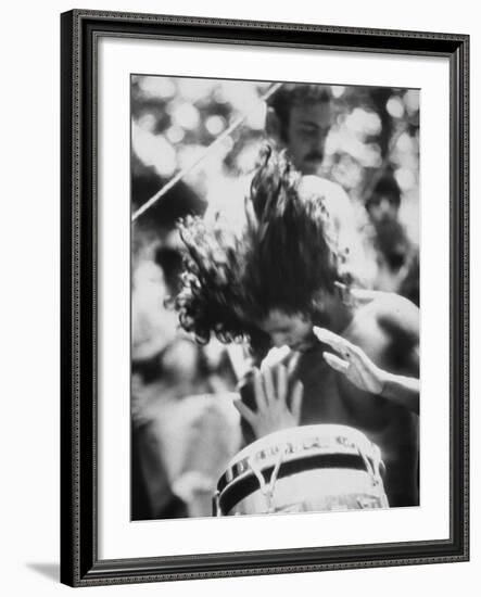 Guy Playing Drums at Woodstock Music Festival-null-Framed Photographic Print