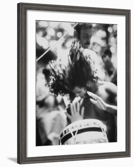 Guy Playing Drums at Woodstock Music Festival-null-Framed Photographic Print