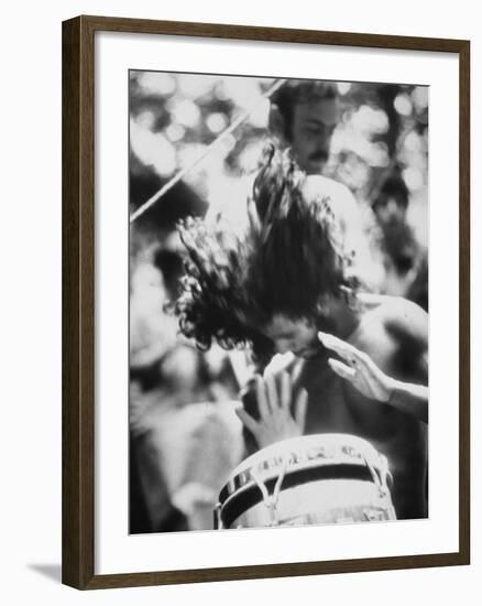 Guy Playing Drums at Woodstock Music Festival-null-Framed Photographic Print