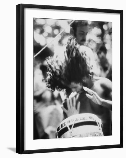 Guy Playing Drums at Woodstock Music Festival-null-Framed Photographic Print