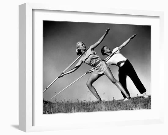 Gym Teachers Throwing Javelins at Hiddensee-Alfred Eisenstaedt-Framed Photographic Print