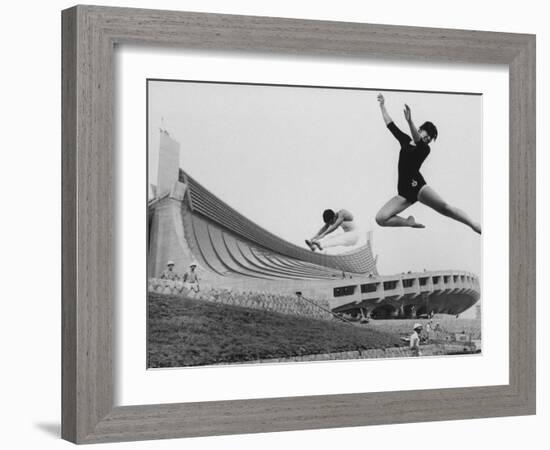 Gymnasts Outside the New Olympic Building in Japan-Larry Burrows-Framed Photographic Print