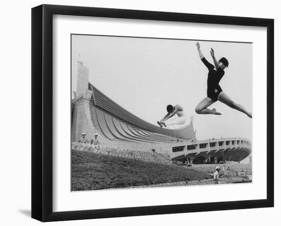 Gymnasts Outside the New Olympic Building in Japan-Larry Burrows-Framed Photographic Print