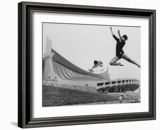 Gymnasts Outside the New Olympic Building in Japan-Larry Burrows-Framed Photographic Print