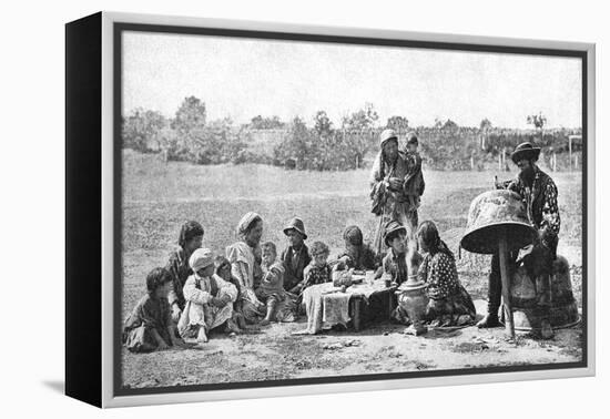 Gypsies Mending a Family Cauldron, Hungary, 1922-AW Cutler-Framed Premier Image Canvas