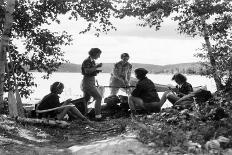 1930s 5 GIRLS AROUND CAMP FIRE NEAR LAKE CANOE SUMMER YOUTH ALGONQUIN PARK CANADA-H. Armstrong Roberts-Photographic Print