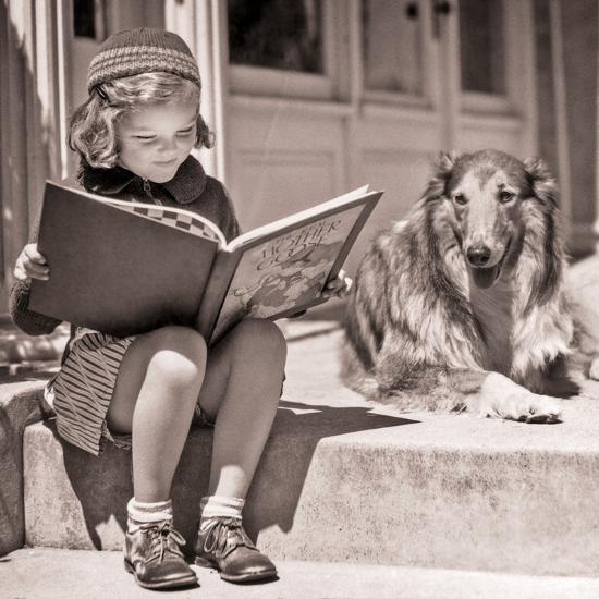 Engrsse 1930s ENGROSSED LITTLE GIRL OUTDOOR READING BIG BOOK SITTING NEXT TO ...