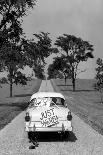 1950s BACK OF WHITE FORD SEDAN DRIVING OFF WITH JUST MARRIED SIGN ON TRUNK-H. Armstrong Roberts-Photographic Print