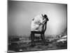 H.B. Leckler's Dog Mace Posing Atop a Chair Outdoors in Ft. Greene, Brooklyn, NY-Wallace G^ Levison-Mounted Photographic Print