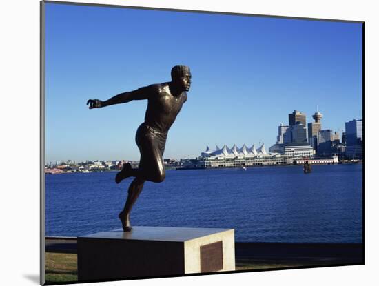 H W Jerome Statue with the City Skyline of Vancouver in the Background, British Columbia, Canada-Hans Peter Merten-Mounted Photographic Print