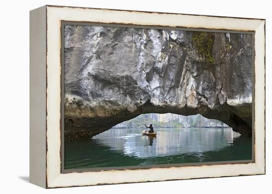 Ha Long Bay, Vietnam. View of kayaker through limestone arch.-Yvette Cardozo-Framed Premier Image Canvas