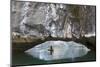 Ha Long Bay, Vietnam. View of kayaker through limestone arch.-Yvette Cardozo-Mounted Photographic Print