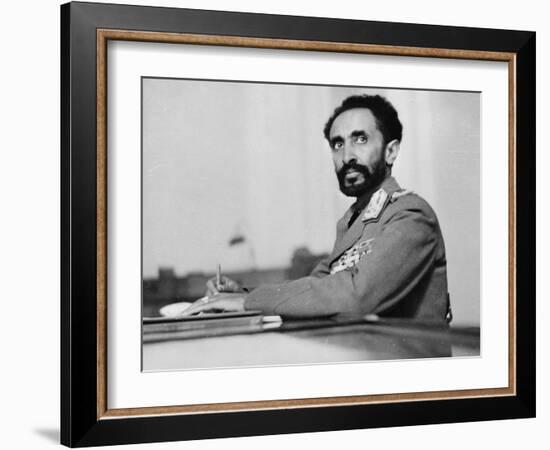 Haile Selassie in his study at the palace, Addis Ababa, c.1942.-null-Framed Photographic Print