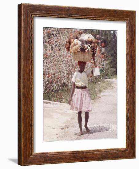 Haitian Woman Carrying Large Basket with Her Market Shopping on Her Head-Lynn Pelham-Framed Photographic Print