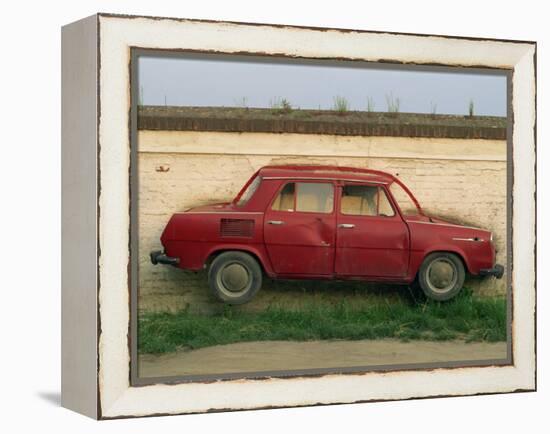 Half a Skoda on a Wall in a Car Salesyard Near Piestany, Slovakia, Europe-Strachan James-Framed Premier Image Canvas