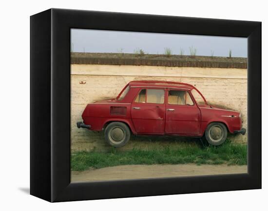 Half a Skoda on a Wall in a Car Salesyard Near Piestany, Slovakia, Europe-Strachan James-Framed Premier Image Canvas