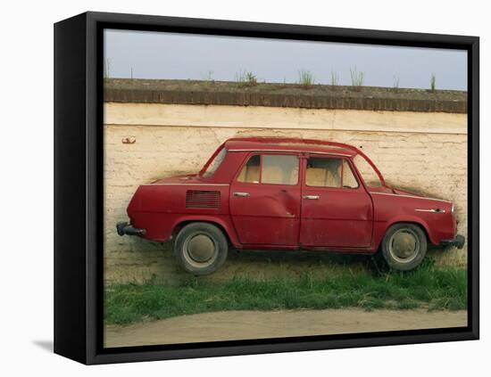 Half a Skoda on a Wall in a Car Salesyard Near Piestany, Slovakia, Europe-Strachan James-Framed Premier Image Canvas