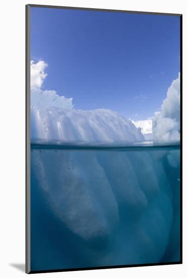 Half above and half below photo of an iceberg off Danco Island, Antarctica, Polar Regions-Michael Nolan-Mounted Photographic Print