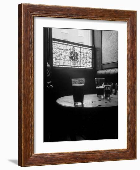 Half Empty Glasses of Beer Left on Table in the Blue Lion Pub in Dublin-Gjon Mili-Framed Photographic Print