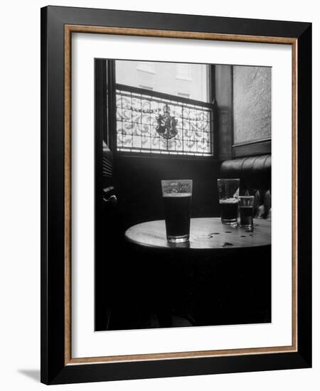 Half Empty Glasses of Beer Left on Table in the Blue Lion Pub in Dublin-Gjon Mili-Framed Photographic Print