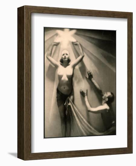 Half Naked Man and Woman During a Performance at the French Music Hall, the Folies Bergere-null-Framed Photographic Print