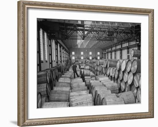 Half Ton Hogsheads of Tobacco, Stored in the Warehouse on King Albert Docks, Port of London-Carl Mydans-Framed Premium Photographic Print