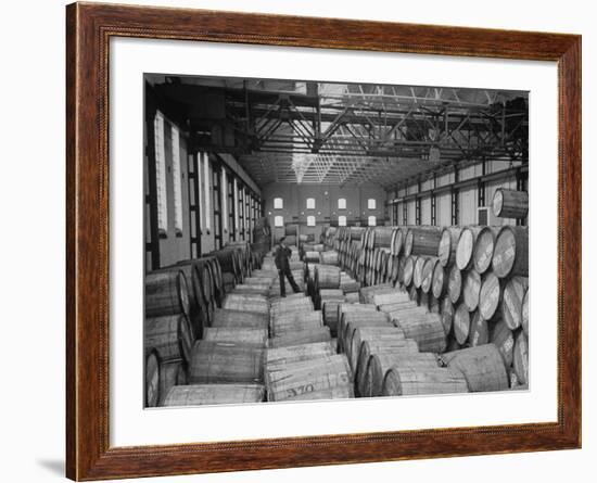 Half Ton Hogsheads of Tobacco, Stored in the Warehouse on King Albert Docks, Port of London-Carl Mydans-Framed Premium Photographic Print