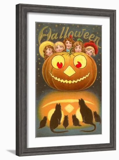 Halloween, Children behind Jack O'Lantern-null-Framed Art Print