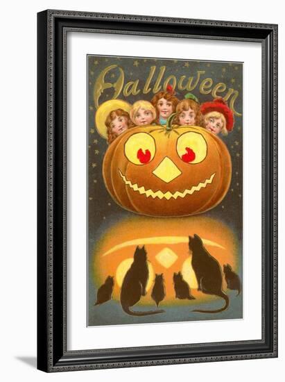 Halloween, Children behind Jack O'Lantern-null-Framed Art Print