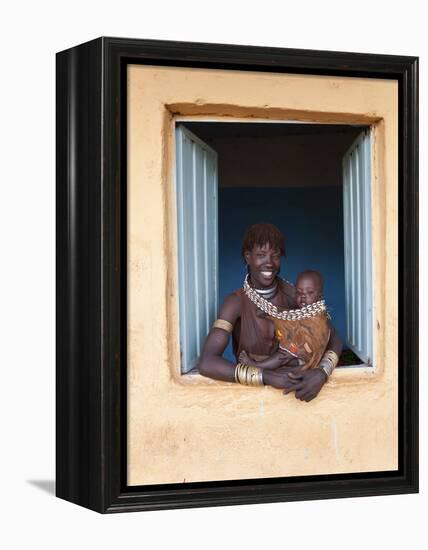 Hamer Woman with Baby-Peter Adams-Framed Premier Image Canvas