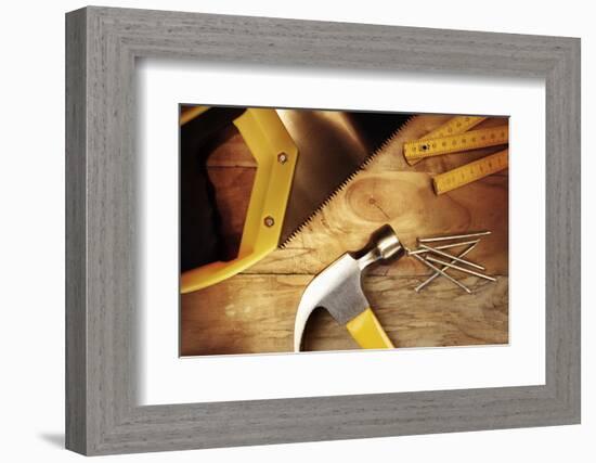 Hammer, Nails, Ruler and Saw on Wood-STILLFX-Framed Photographic Print