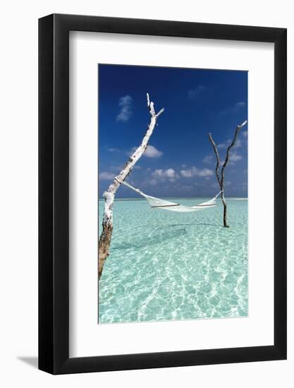 Hammock over the waters of a tropical lagoon, The Maldives, Indian Ocean, Asia-Sakis Papadopoulos-Framed Photographic Print