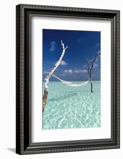 Hammock over the waters of a tropical lagoon, The Maldives, Indian Ocean, Asia-Sakis Papadopoulos-Framed Photographic Print