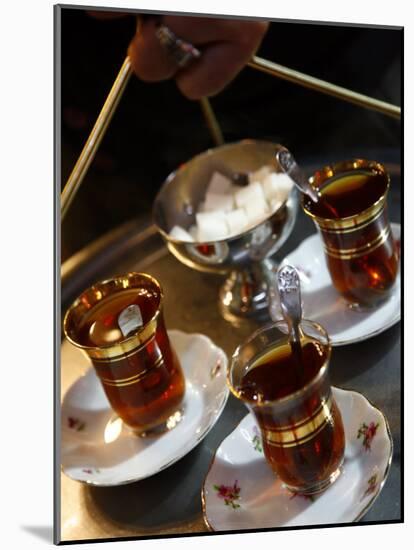 Hand Holding a Tray with Turkish Tea, Istanbul, Turkey, Europe-Levy Yadid-Mounted Photographic Print